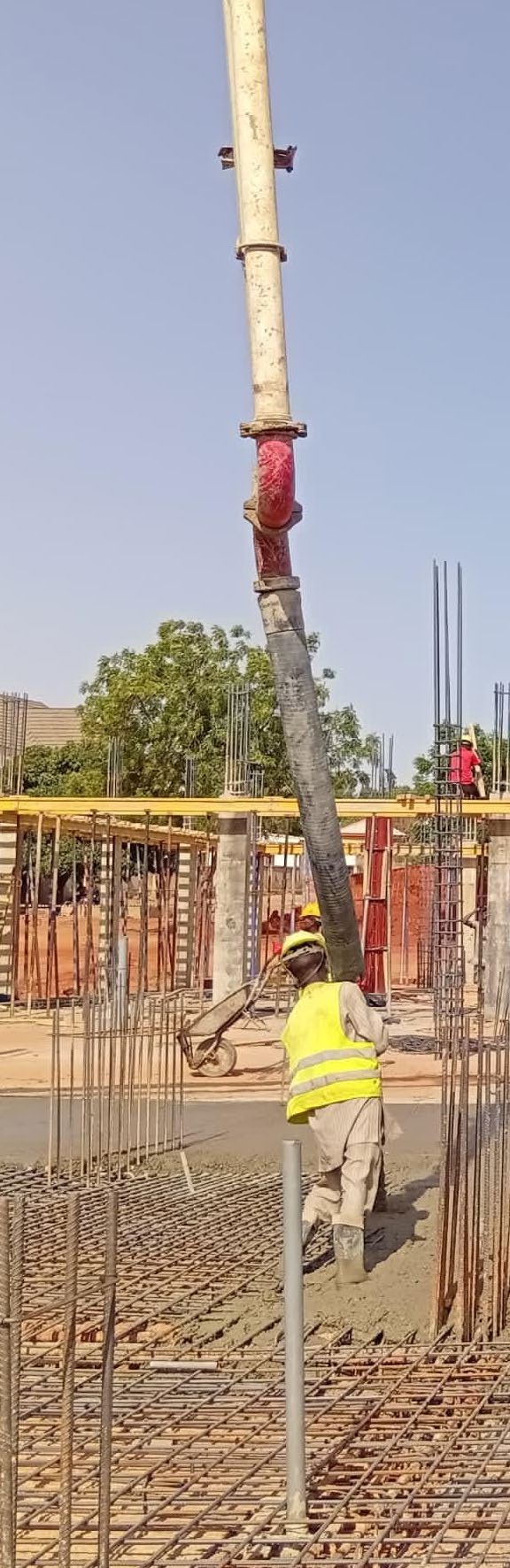 Concrete pour over rebar mats on a BMC site