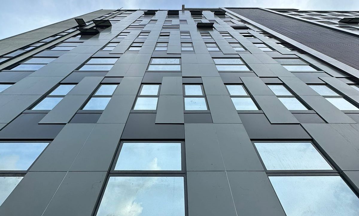 Aluminum cladding and glazing detail of the Palm House tower, seen from below